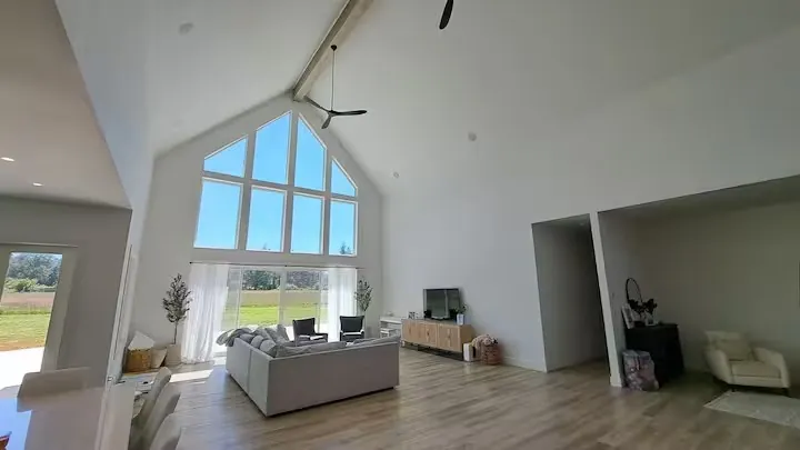 Smart home — bright living area with farm views
