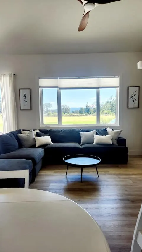 Suite living area with farm views